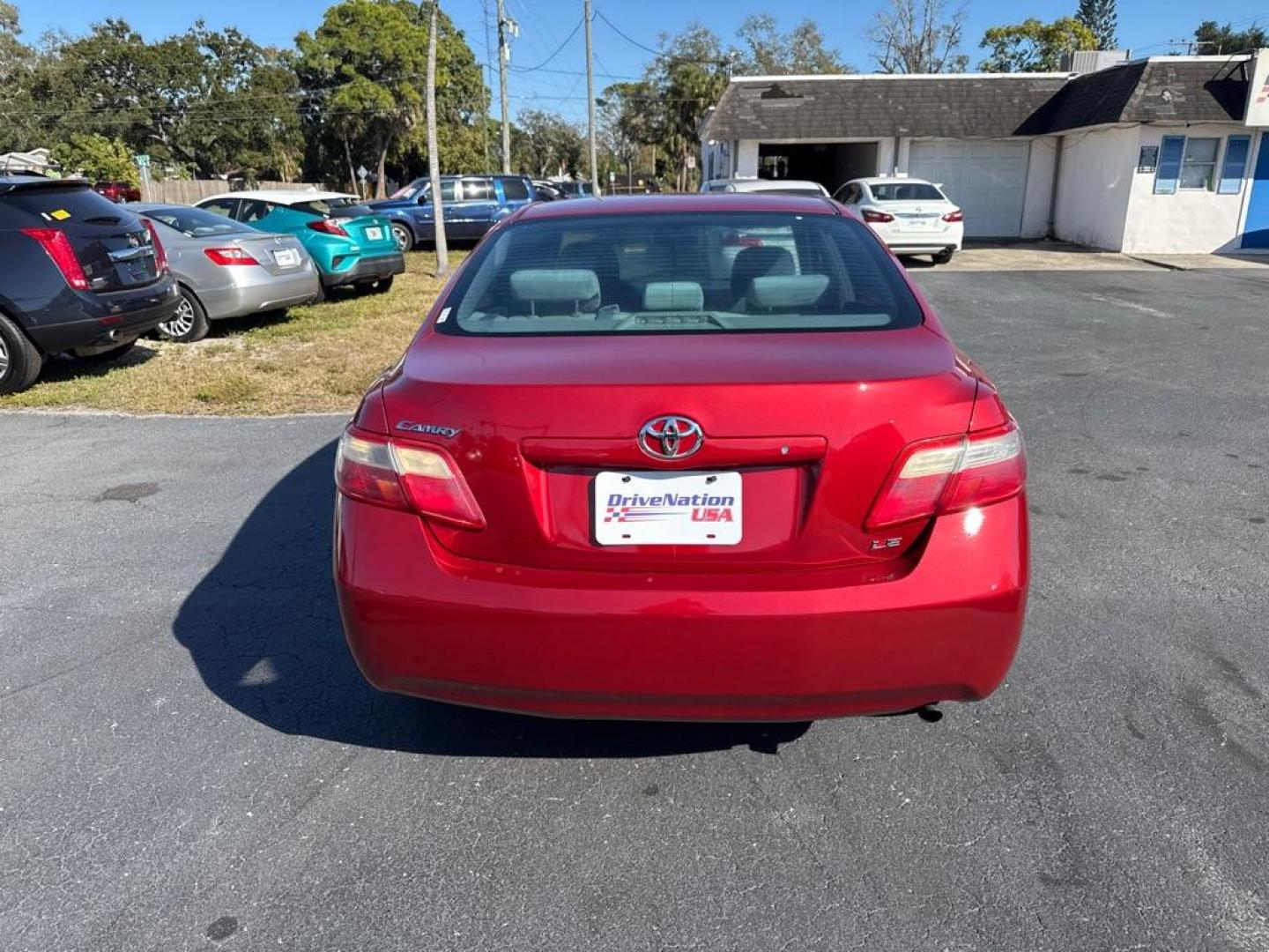2009 RED TOYOTA CAMRY LE (4T1BE46K09U) with an 2.4L engine, Automatic transmission, located at 2929 9th St. West, Bradenton, 34205, (941) 242-2810, 27.473591, -82.570679 - Photo#5