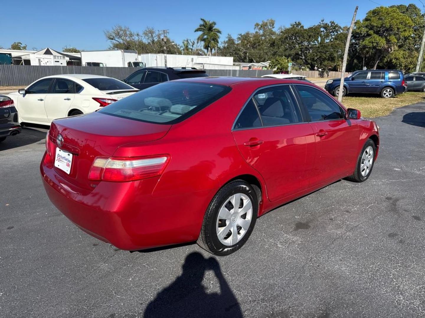 2009 RED TOYOTA CAMRY LE (4T1BE46K09U) with an 2.4L engine, Automatic transmission, located at 2929 9th St. West, Bradenton, 34205, (941) 242-2810, 27.473591, -82.570679 - Photo#6