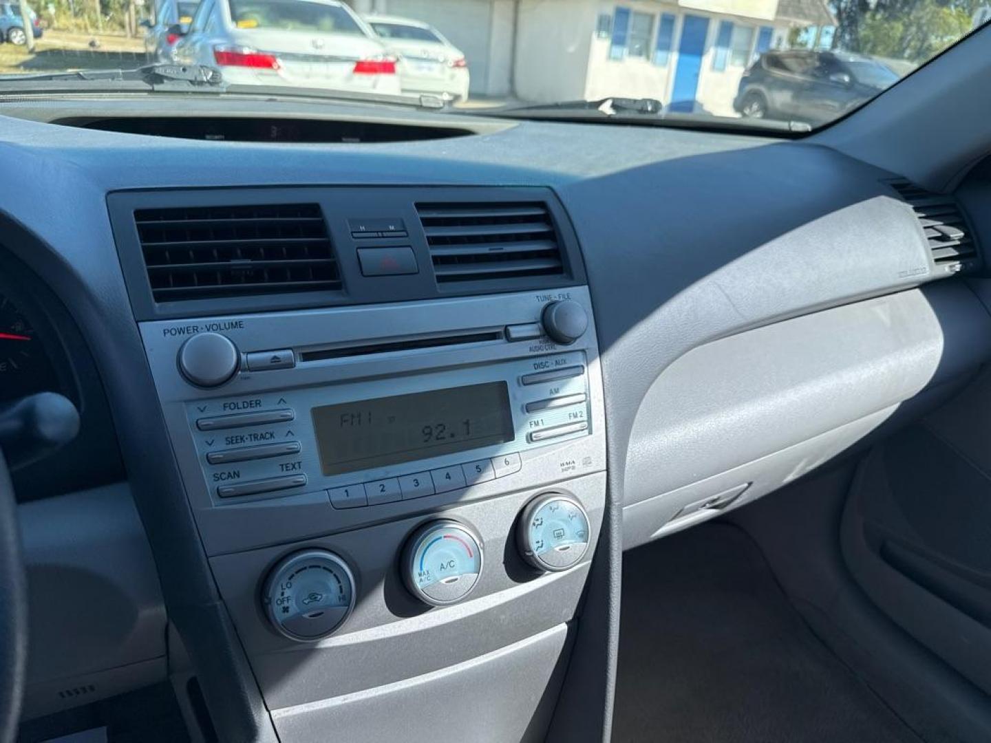 2009 RED TOYOTA CAMRY LE (4T1BE46K09U) with an 2.4L engine, Automatic transmission, located at 2929 9th St. West, Bradenton, 34205, (941) 242-2810, 27.473591, -82.570679 - Photo#9