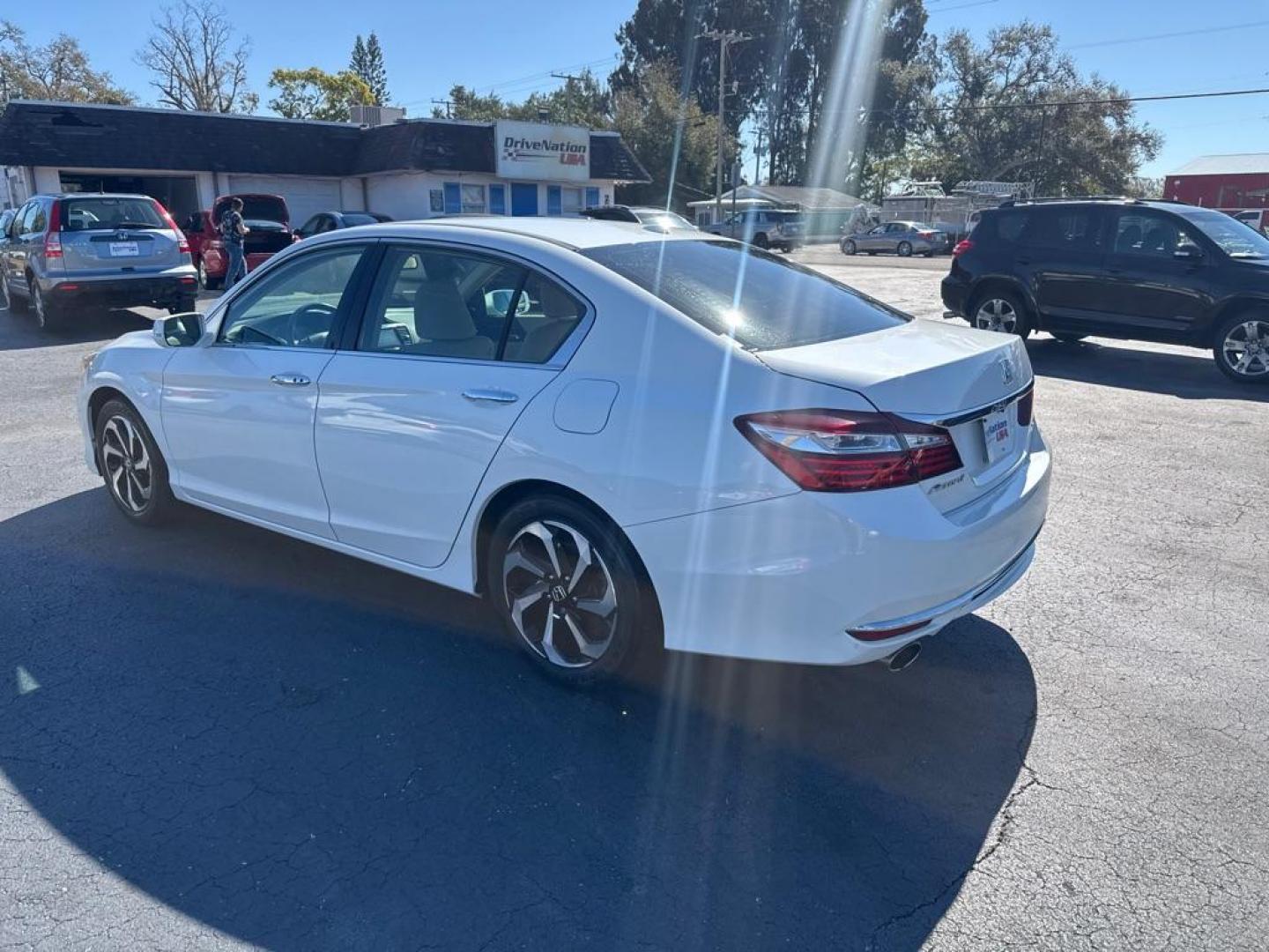 2017 WHITE HONDA ACCORD EXL (1HGCR3F89HA) with an 3.5L engine, Automatic transmission, located at 2929 9th St. West, Bradenton, 34205, (941) 242-2810, 27.473591, -82.570679 - Thanks for inquring into DriveNation USA! All vehicles listed can be viewed at www.drivenationusa.com for vehicle history reports and additonal info. We cannot quote any terms such as down payments or monthly payments without an application. You can apply directly at www.drivenationusa.com or by con - Photo#4