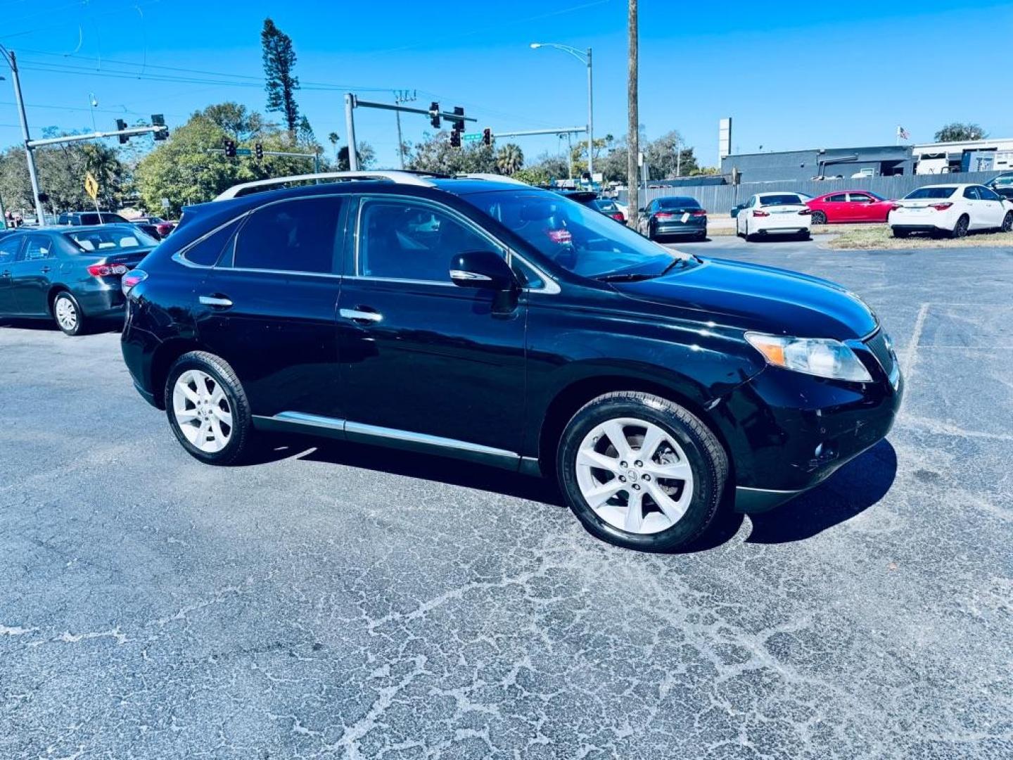 2011 BLACK LEXUS RX 350 (2T2ZK1BA4BC) with an 3.5L engine, Automatic transmission, located at 2929 9th St. West, Bradenton, 34205, (941) 242-2810, 27.473591, -82.570679 - Photo#1