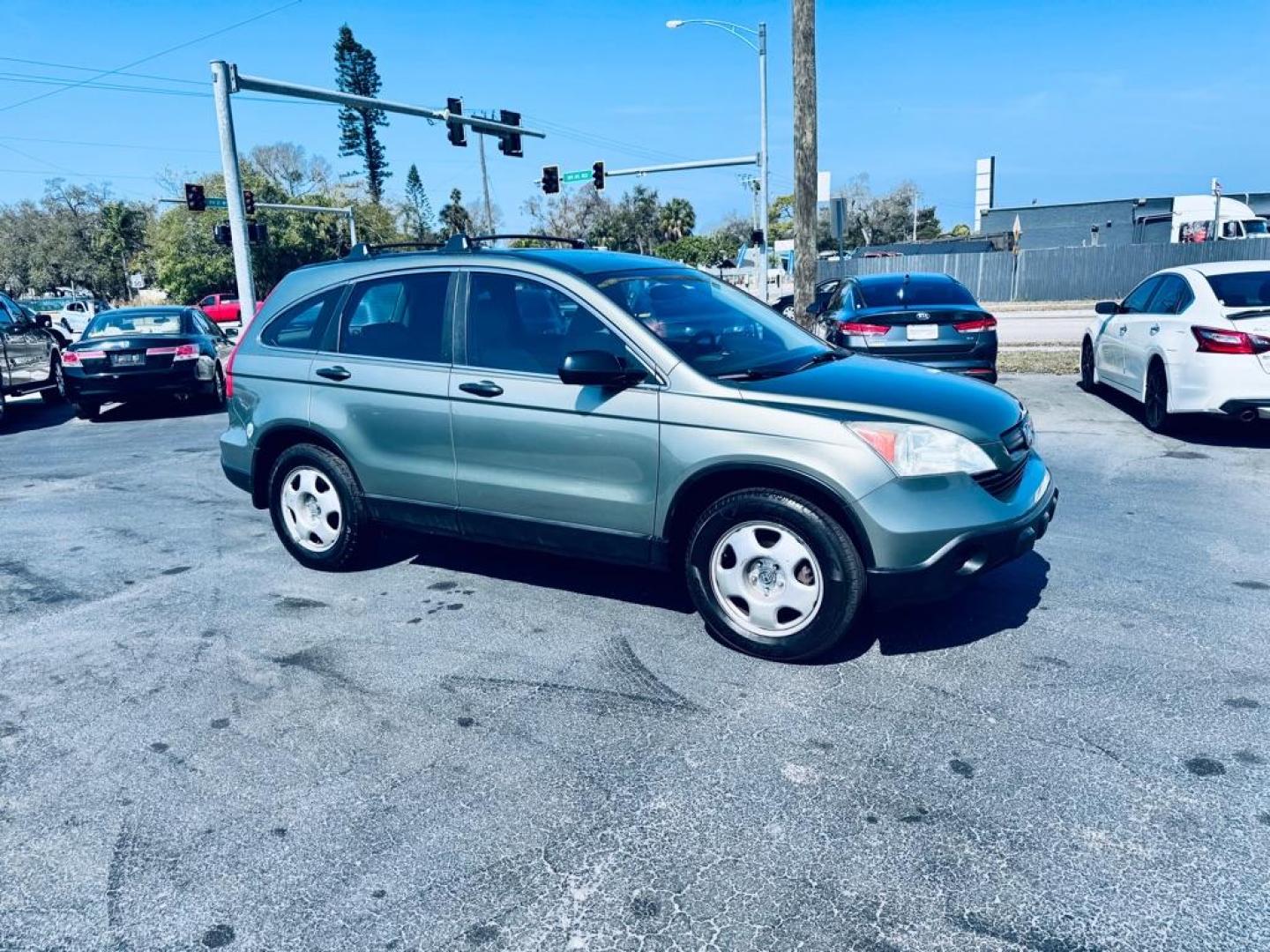 2009 GREEN HONDA CR-V LX (5J6RE38369L) with an 2.4L engine, Automatic transmission, located at 2929 9th St. West, Bradenton, 34205, (941) 242-2810, 27.473591, -82.570679 - Thanks for inquring into DriveNation USA! All vehicles listed can be viewed at www.drivenationusa.com for vehicle history reports and additonal info. We cannot quote any terms such as down payments or monthly payments without an application. You can apply directly at www.drivenationusa.com or by con - Photo#1