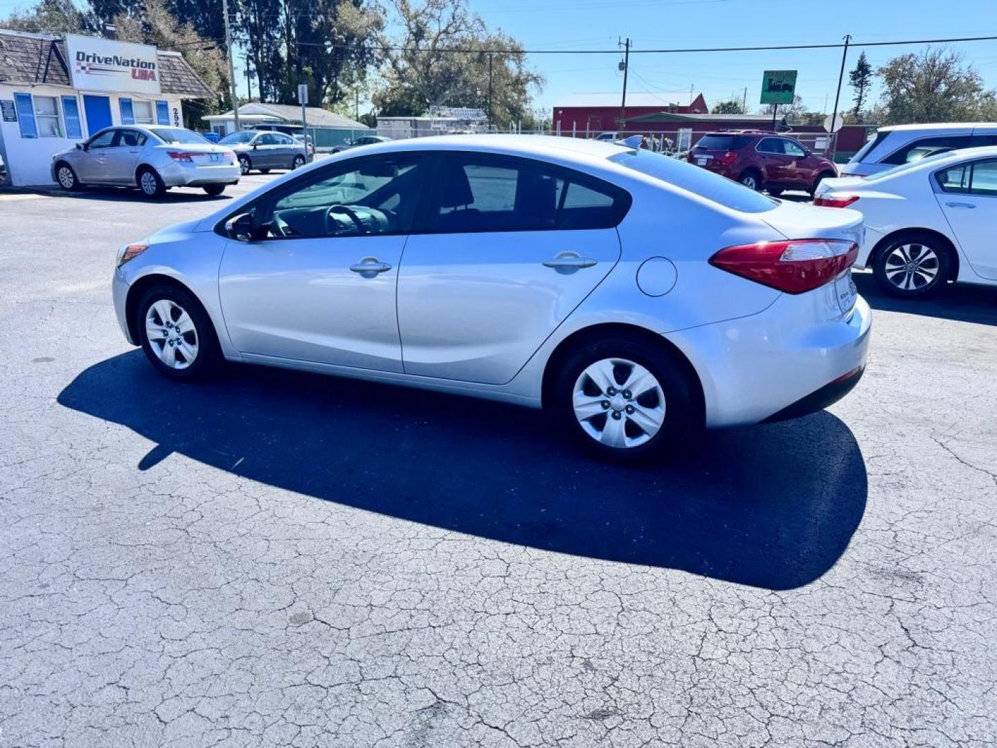 2015 SILVER KIA FORTE LX (KNAFX4A62F5) with an 1.8L engine, Automatic transmission, located at 2929 9th St. West, Bradenton, 34205, (941) 242-2810, 27.473591, -82.570679 - Thanks for inquring into DriveNation USA! All vehicles listed can be viewed at www.drivenationusa.com for vehicle history reports and additonal info. We cannot quote any terms such as down payments or monthly payments without an application. You can apply directly at www.drivenationusa.com or by con - Photo#4