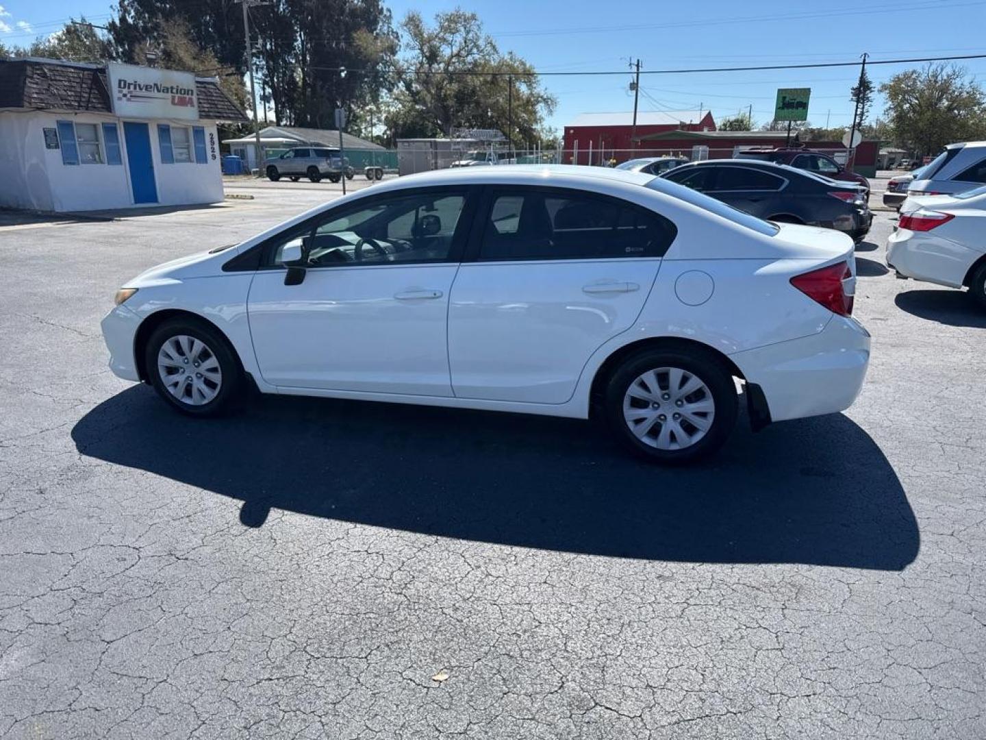 2012 WHITE HONDA CIVIC LX (19XFB2F52CE) with an 1.8L engine, Automatic transmission, located at 2929 9th St. West, Bradenton, 34205, (941) 242-2810, 27.473591, -82.570679 - Thanks for inquring into DriveNation USA! All vehicles listed can be viewed at www.drivenationusa.com for vehicle history reports and additonal info. We cannot quote any terms such as down payments or monthly payments without an application. You can apply directly at www.drivenationusa.com or by con - Photo#4