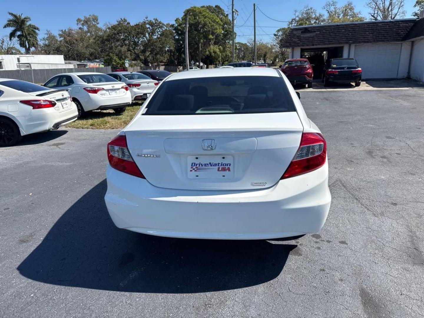 2012 WHITE HONDA CIVIC LX (19XFB2F52CE) with an 1.8L engine, Automatic transmission, located at 2929 9th St. West, Bradenton, 34205, (941) 242-2810, 27.473591, -82.570679 - Thanks for inquring into DriveNation USA! All vehicles listed can be viewed at www.drivenationusa.com for vehicle history reports and additonal info. We cannot quote any terms such as down payments or monthly payments without an application. You can apply directly at www.drivenationusa.com or by con - Photo#6