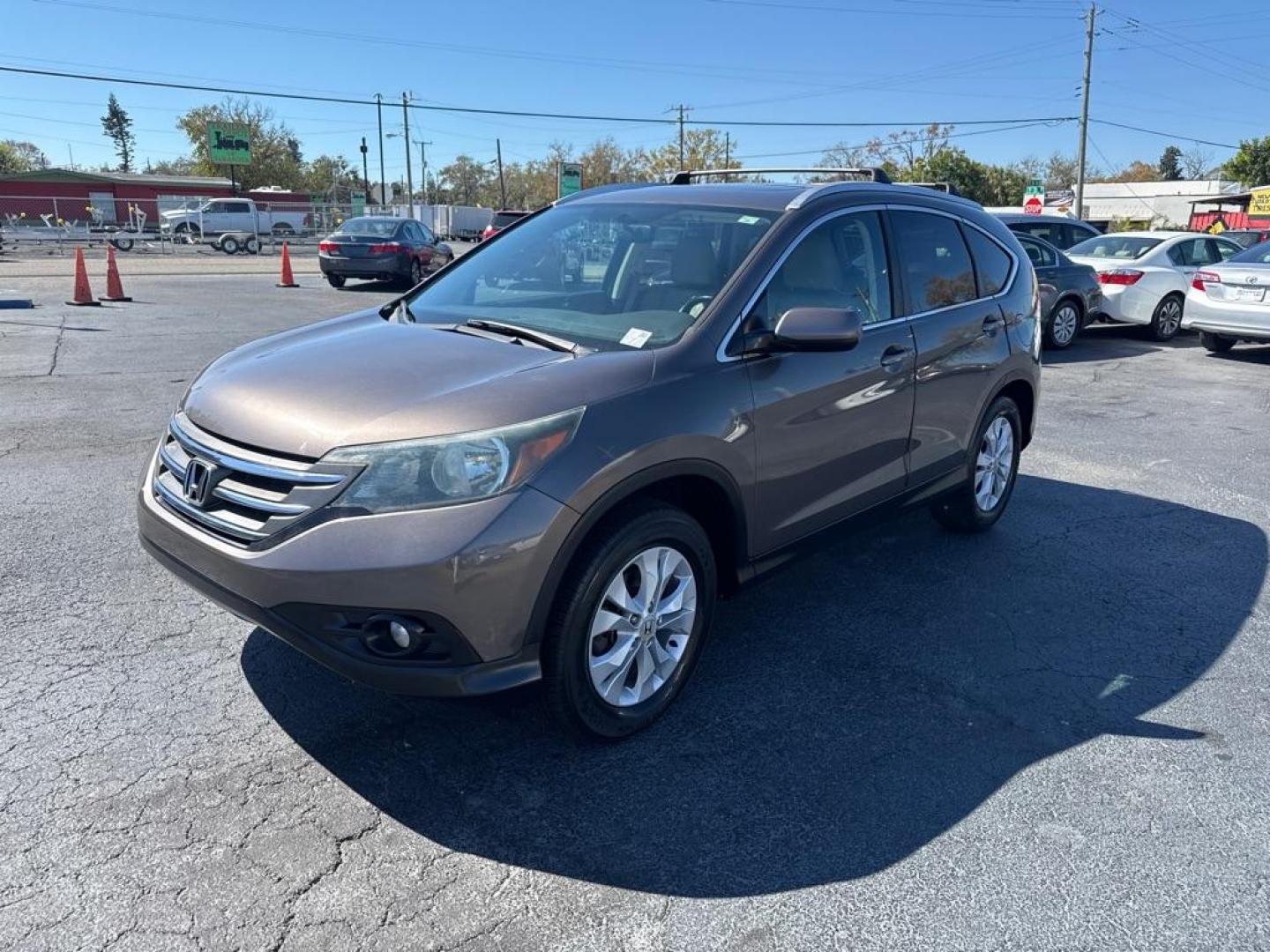 2014 BROWN HONDA CR-V EXL (2HKRM3H76EH) with an 2.4L engine, Automatic transmission, located at 2929 9th St. West, Bradenton, 34205, (941) 242-2810, 27.473591, -82.570679 - Thanks for inquring into DriveNation USA! All vehicles listed can be viewed at www.drivenationusa.com for vehicle history reports and additonal info. We cannot quote any terms such as down payments or monthly payments without an application. You can apply directly at www.drivenationusa.com or by con - Photo#3