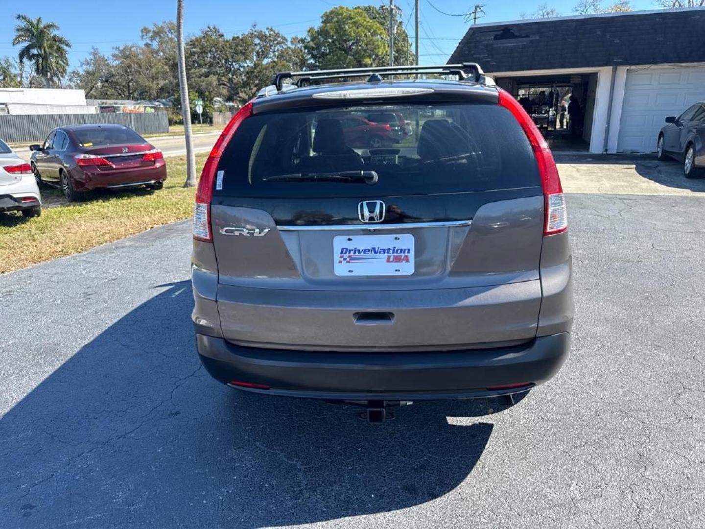 2014 BROWN HONDA CR-V EXL (2HKRM3H76EH) with an 2.4L engine, Automatic transmission, located at 2929 9th St. West, Bradenton, 34205, (941) 242-2810, 27.473591, -82.570679 - Thanks for inquring into DriveNation USA! All vehicles listed can be viewed at www.drivenationusa.com for vehicle history reports and additonal info. We cannot quote any terms such as down payments or monthly payments without an application. You can apply directly at www.drivenationusa.com or by con - Photo#5