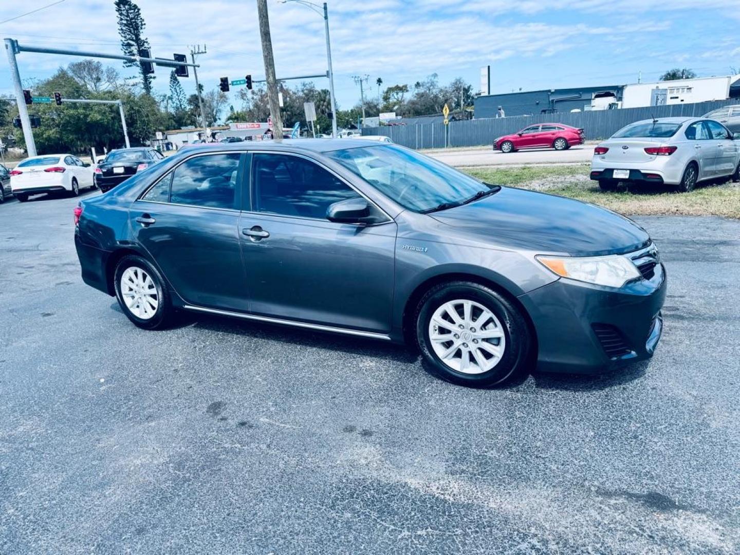 2014 GRAY TOYOTA CAMRY HYBRID (4T1BD1FK0EU) with an 2.5L engine, Continuously Variable transmission, located at 2929 9th St. West, Bradenton, 34205, (941) 242-2810, 27.473591, -82.570679 - Photo#1