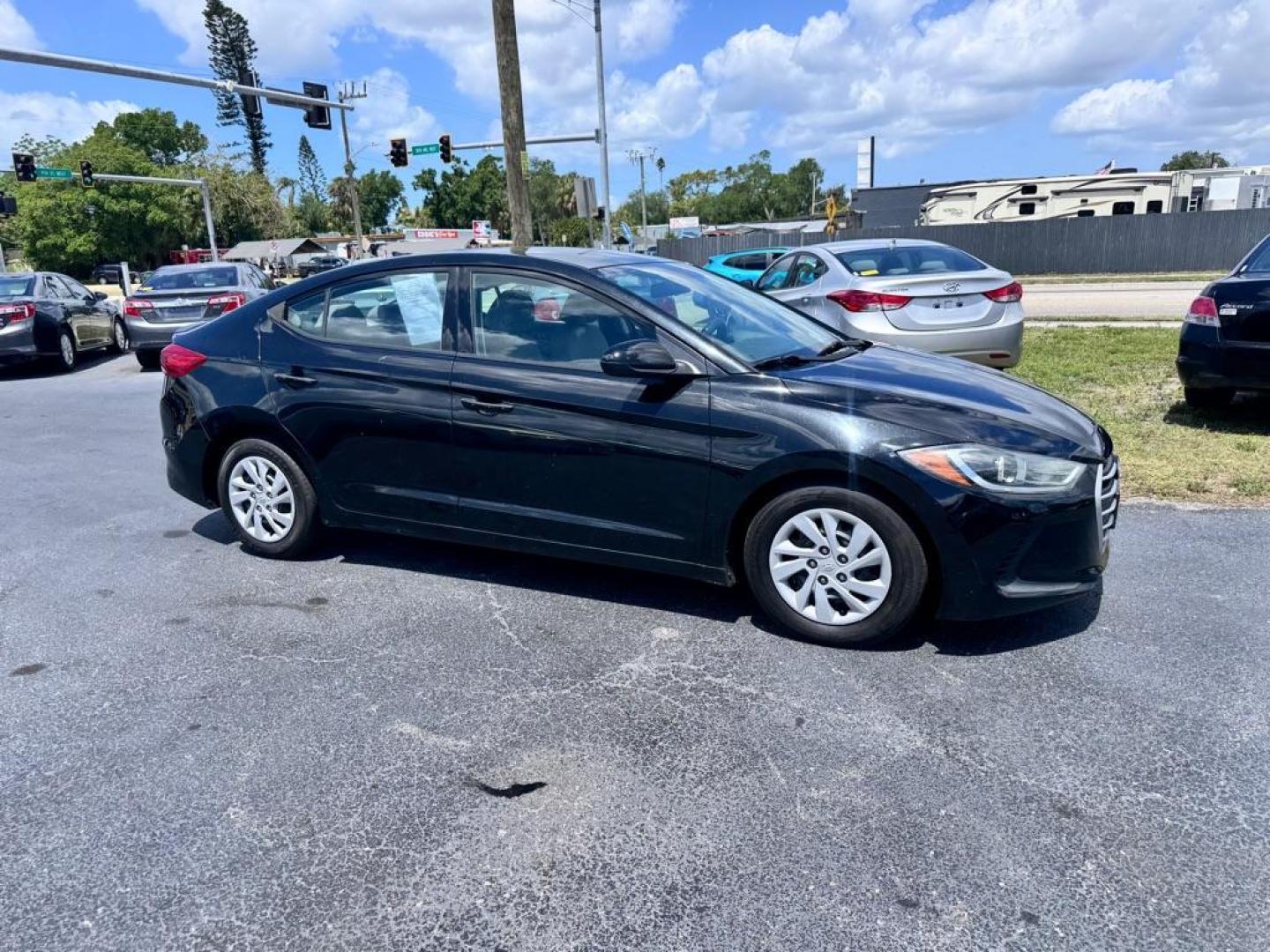 2017 BLACK HYUNDAI ELANTRA SE (5NPD74LF5HH) with an 2.0L engine, Automatic transmission, located at 2929 9th St. West, Bradenton, 34205, (941) 242-2810, 27.473591, -82.570679 - Thanks for inquring into DriveNation USA! All vehicles listed can be viewed at www.drivenationusa.com for vehicle history reports and additonal info. We cannot quote any terms such as down payments or monthly payments without an application. You can apply directly at www.drivenationusa.com or by con - Photo#0