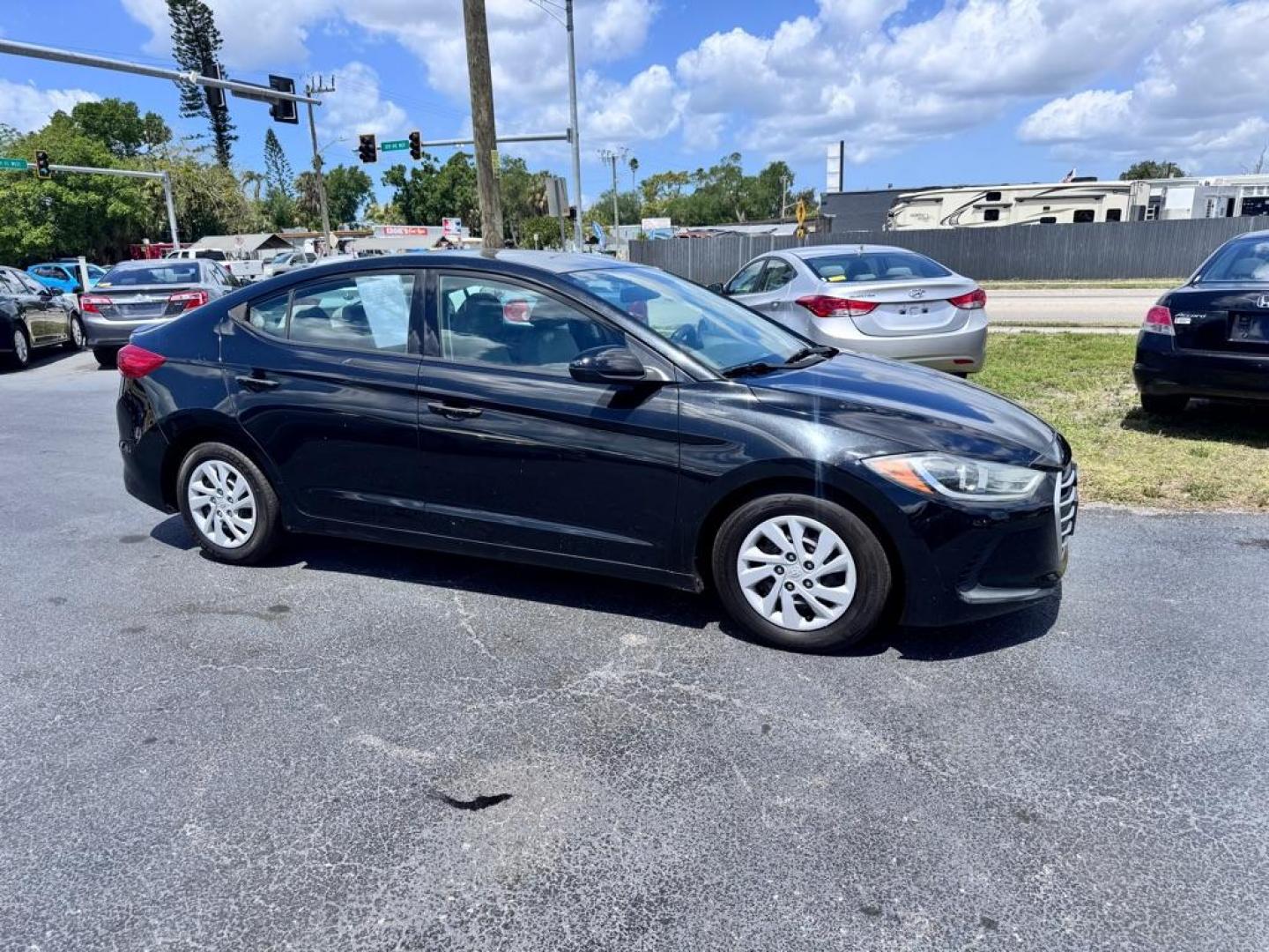 2017 BLACK HYUNDAI ELANTRA SE (5NPD74LF5HH) with an 2.0L engine, Automatic transmission, located at 2929 9th St. West, Bradenton, 34205, (941) 242-2810, 27.473591, -82.570679 - Thanks for inquring into DriveNation USA! All vehicles listed can be viewed at www.drivenationusa.com for vehicle history reports and additonal info. We cannot quote any terms such as down payments or monthly payments without an application. You can apply directly at www.drivenationusa.com or by con - Photo#1