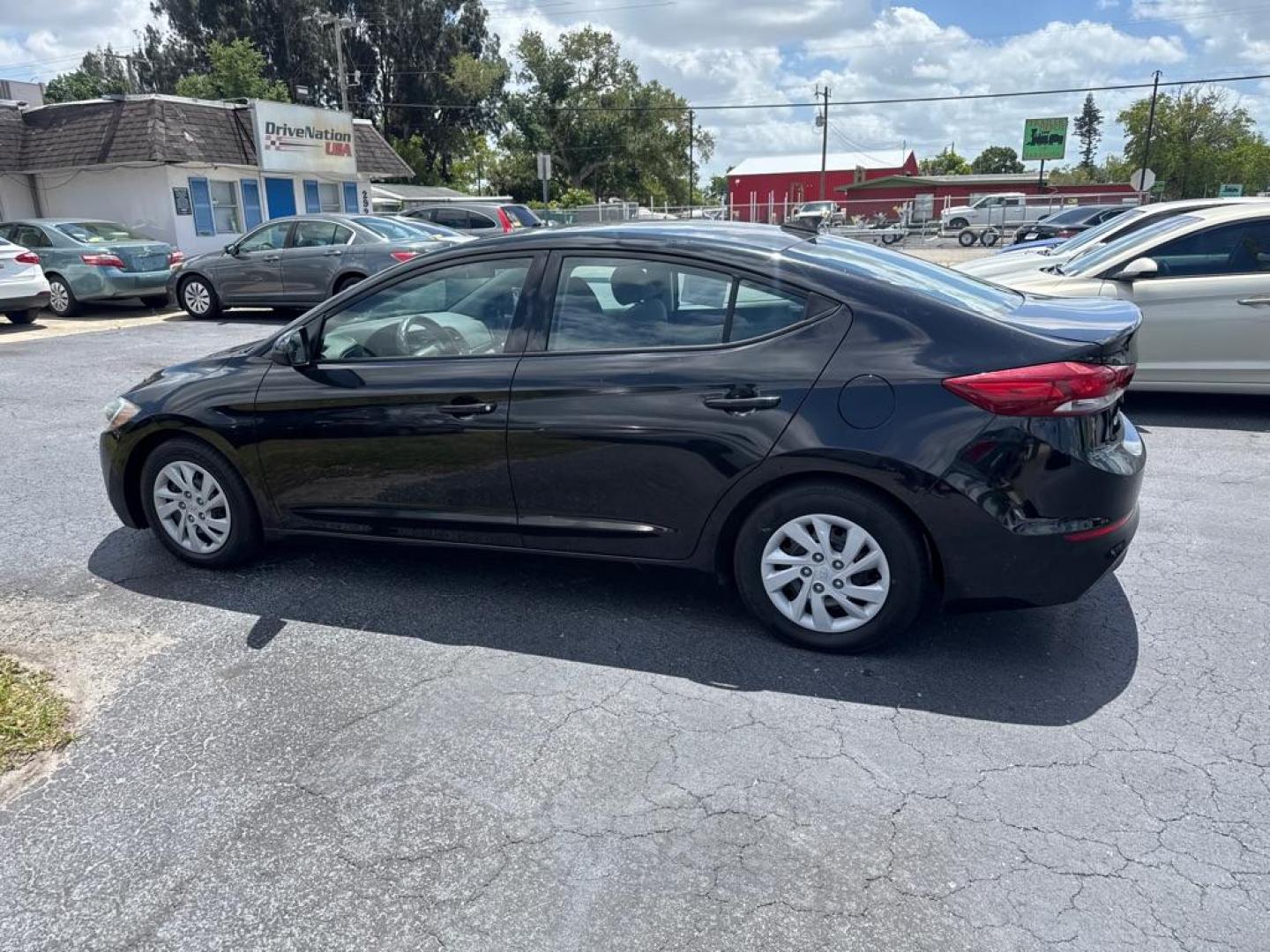 2017 BLACK HYUNDAI ELANTRA SE (5NPD74LF5HH) with an 2.0L engine, Automatic transmission, located at 2929 9th St. West, Bradenton, 34205, (941) 242-2810, 27.473591, -82.570679 - Thanks for inquring into DriveNation USA! All vehicles listed can be viewed at www.drivenationusa.com for vehicle history reports and additonal info. We cannot quote any terms such as down payments or monthly payments without an application. You can apply directly at www.drivenationusa.com or by con - Photo#4