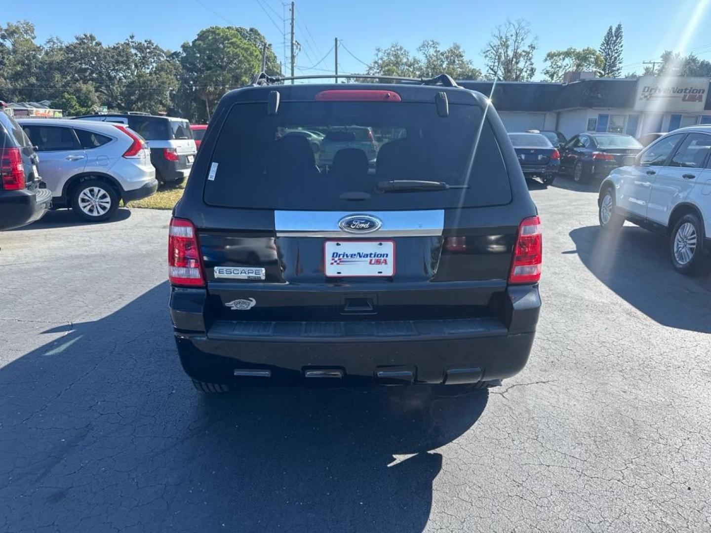 2012 BLACK FORD ESCAPE XLS (1FMCU0C76CK) with an 2.5L engine, Automatic transmission, located at 2929 9th St. West, Bradenton, 34205, (941) 242-2810, 27.473591, -82.570679 - Thanks for inquring into DriveNation USA! All vehicles listed can be viewed at www.drivenationusa.com for vehicle history reports and additonal info. We cannot quote any terms such as down payments or monthly payments without an application. You can apply directly at www.drivenationusa.com or by con - Photo#4