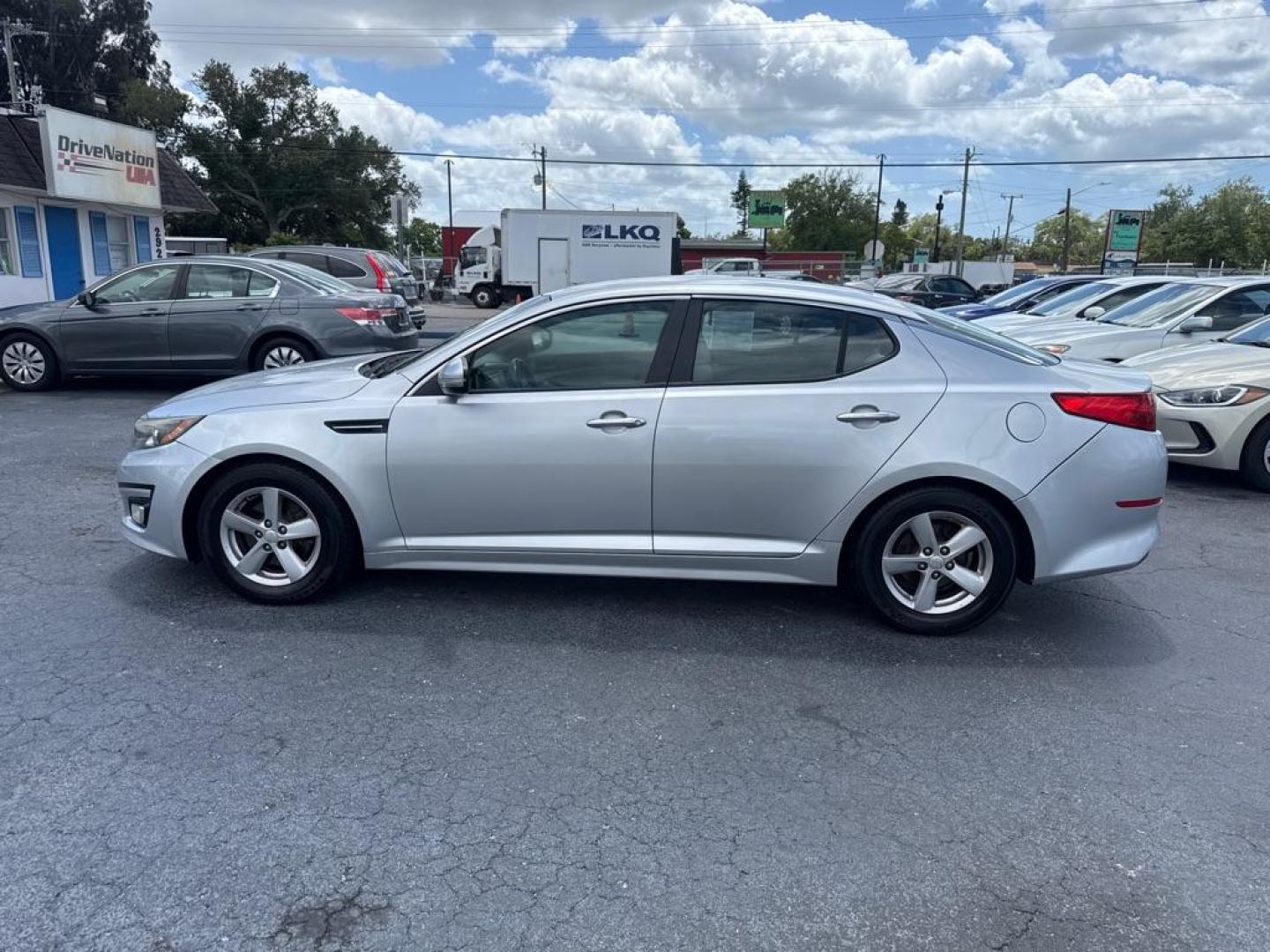 2014 SILVER KIA OPTIMA LX (5XXGM4A75EG) with an 2.4L engine, Automatic transmission, located at 2929 9th St. West, Bradenton, 34205, (941) 242-2810, 27.473591, -82.570679 - Photo#4