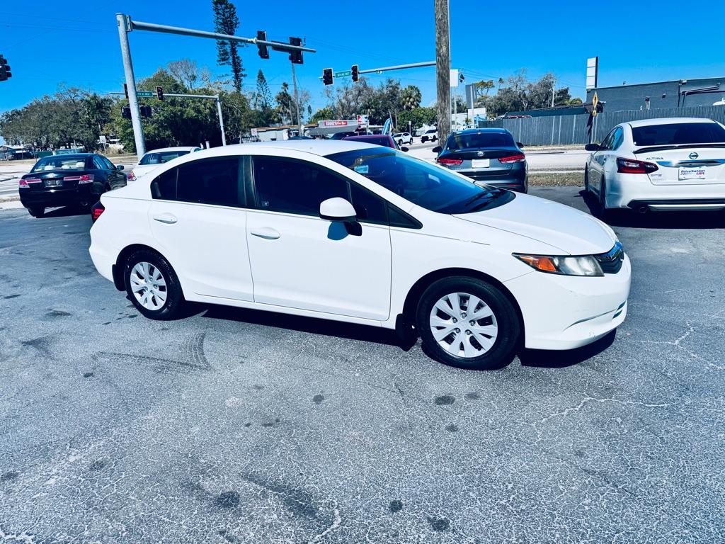 2015 WHITE HONDA CIVIC LX (19XFB2F52FE) with an 1.8L engine, Continuously Variable transmission, located at 2929 9th St. West, Bradenton, 34205, (941) 242-2810, 27.473591, -82.570679 - Thanks for inquring into DriveNation USA! All vehicles listed can be viewed at www.drivenationusa.com for vehicle history reports and additonal info. We cannot quote any terms such as down payments or monthly payments without an application. You can apply directly at www.drivenationusa.com or by con - Photo#1