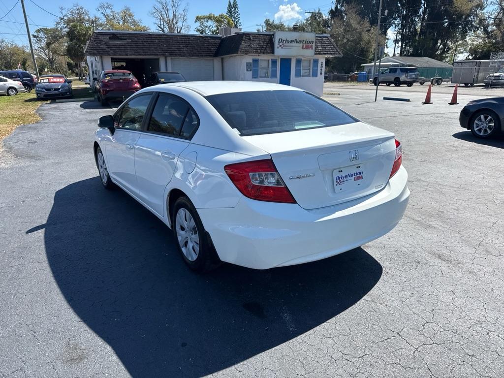 2015 WHITE HONDA CIVIC LX (19XFB2F52FE) with an 1.8L engine, Continuously Variable transmission, located at 2929 9th St. West, Bradenton, 34205, (941) 242-2810, 27.473591, -82.570679 - Thanks for inquring into DriveNation USA! All vehicles listed can be viewed at www.drivenationusa.com for vehicle history reports and additonal info. We cannot quote any terms such as down payments or monthly payments without an application. You can apply directly at www.drivenationusa.com or by con - Photo#5