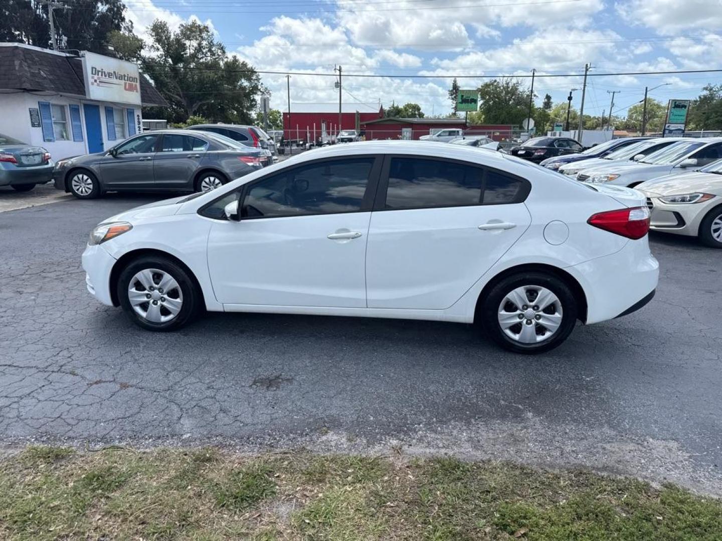 2016 WHITE KIA FORTE LX (KNAFK4A67G5) with an 1.8L engine, Automatic transmission, located at 2929 9th St. West, Bradenton, 34205, (941) 242-2810, 27.473591, -82.570679 - Thanks for inquring into DriveNation USA! All vehicles listed can be viewed at www.drivenationusa.com for vehicle history reports and additonal info. We cannot quote any terms such as down payments or monthly payments without an application. You can apply directly at www.drivenationusa.com or by con - Photo#4