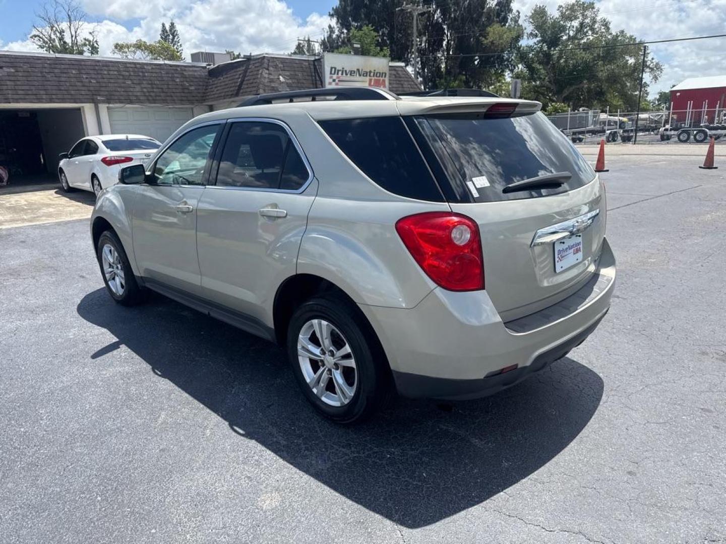 2014 GOLD CHEVROLET EQUINOX LT (2GNALBEKXE6) with an 2.4L engine, Automatic transmission, located at 2929 9th St. West, Bradenton, 34205, (941) 242-2810, 27.473591, -82.570679 - Thanks for inquring into DriveNation USA! All vehicles listed can be viewed at www.drivenationusa.com for vehicle history reports and additonal info. We cannot quote any terms such as down payments or monthly payments without an application. You can apply directly at www.drivenationusa.com or by con - Photo#5
