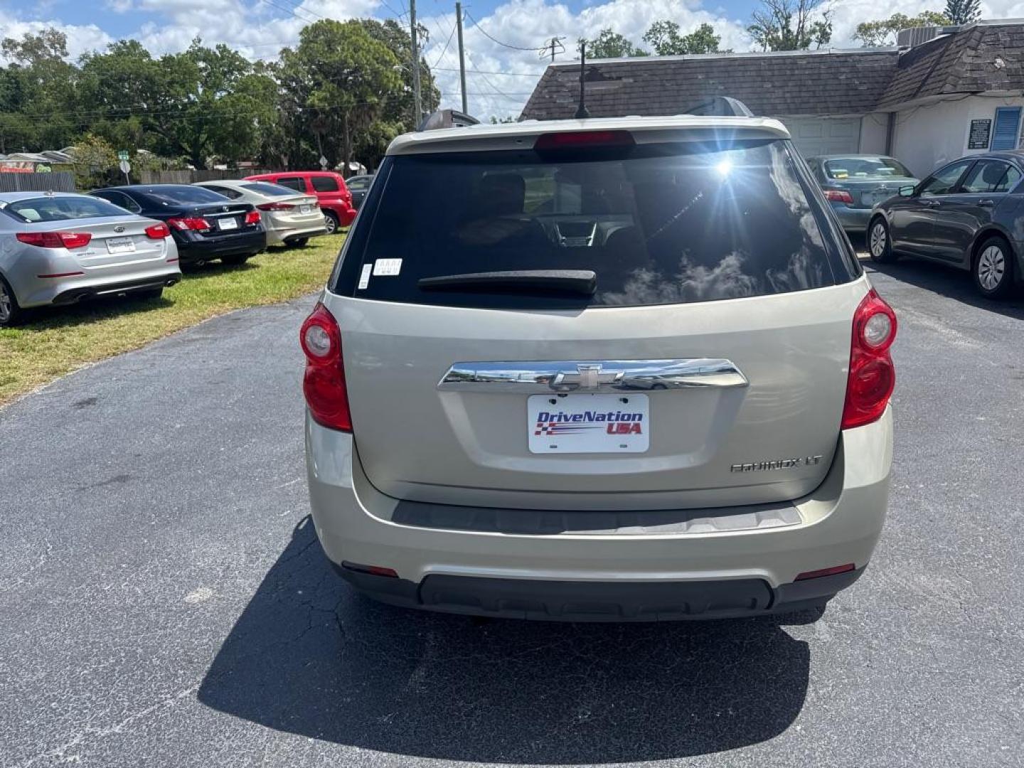 2014 GOLD CHEVROLET EQUINOX LT (2GNALBEKXE6) with an 2.4L engine, Automatic transmission, located at 2929 9th St. West, Bradenton, 34205, (941) 242-2810, 27.473591, -82.570679 - Thanks for inquring into DriveNation USA! All vehicles listed can be viewed at www.drivenationusa.com for vehicle history reports and additonal info. We cannot quote any terms such as down payments or monthly payments without an application. You can apply directly at www.drivenationusa.com or by con - Photo#6