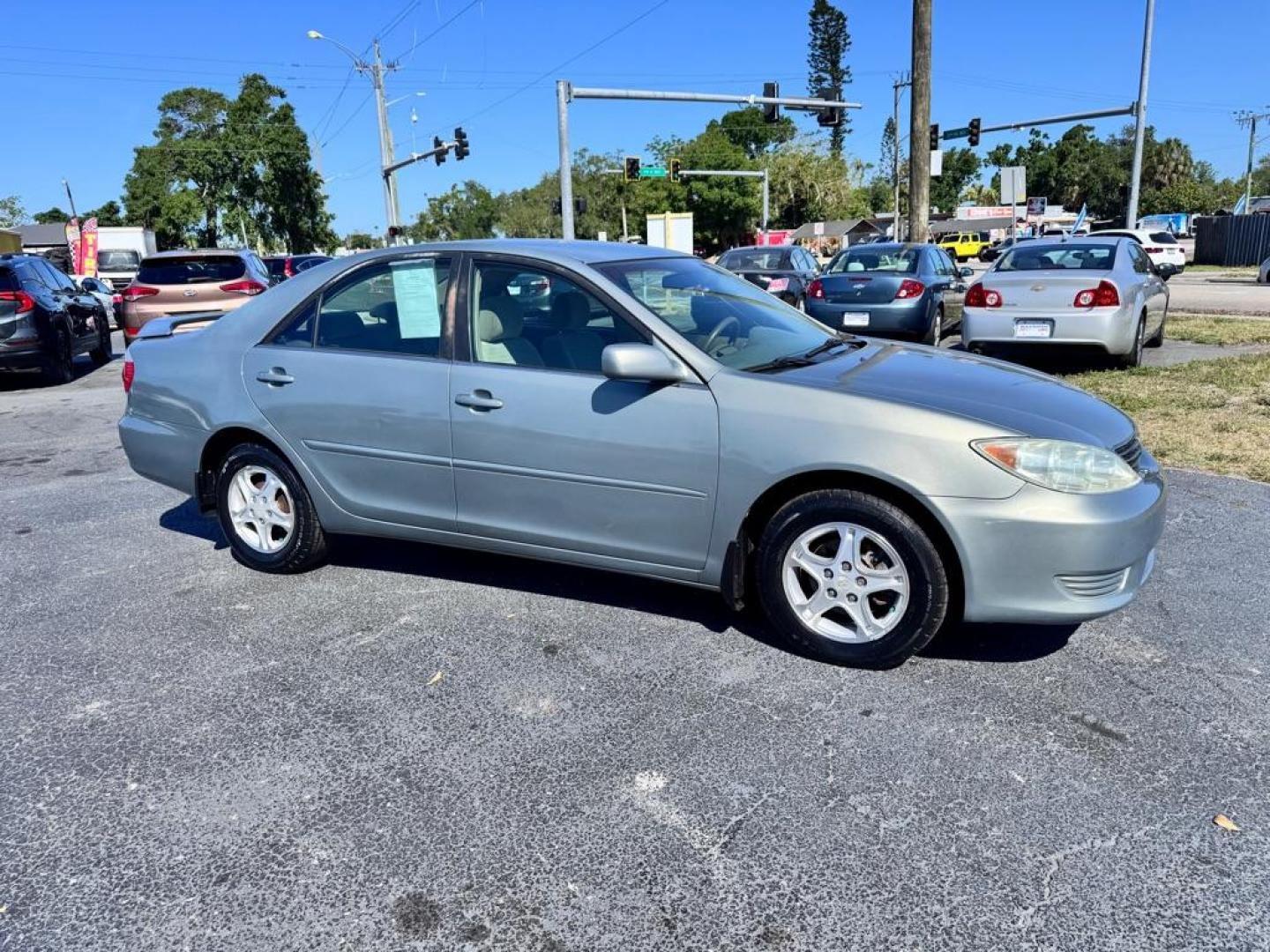 2005 GREEN TOYOTA CAMRY LE (4T1BE32KX5U) with an 2.4L engine, Automatic transmission, located at 2929 9th St. West, Bradenton, 34205, (941) 242-2810, 27.473591, -82.570679 - Thanks for inquring into DriveNation USA! All vehicles listed can be viewed at www.drivenationusa.com for vehicle history reports and additonal info. We cannot quote any terms such as down payments or monthly payments without an application. You can apply directly at www.drivenationusa.com or by con - Photo#0