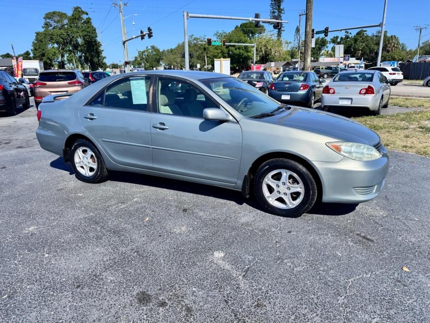 2005 GREEN TOYOTA CAMRY LE (4T1BE32KX5U) with an 2.4L engine, Automatic transmission, located at 2929 9th St. West, Bradenton, 34205, (941) 242-2810, 27.473591, -82.570679 - Thanks for inquring into DriveNation USA! All vehicles listed can be viewed at www.drivenationusa.com for vehicle history reports and additonal info. We cannot quote any terms such as down payments or monthly payments without an application. You can apply directly at www.drivenationusa.com or by con - Photo#1