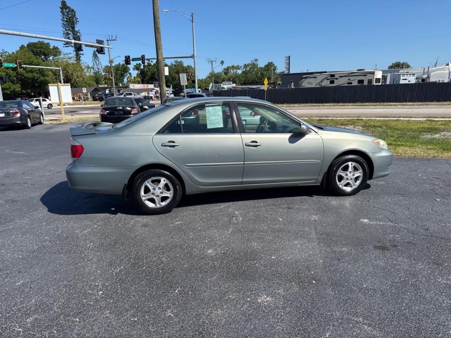 2005 GREEN TOYOTA CAMRY LE (4T1BE32KX5U) with an 2.4L engine, Automatic transmission, located at 2929 9th St. West, Bradenton, 34205, (941) 242-2810, 27.473591, -82.570679 - Thanks for inquring into DriveNation USA! All vehicles listed can be viewed at www.drivenationusa.com for vehicle history reports and additonal info. We cannot quote any terms such as down payments or monthly payments without an application. You can apply directly at www.drivenationusa.com or by con - Photo#8