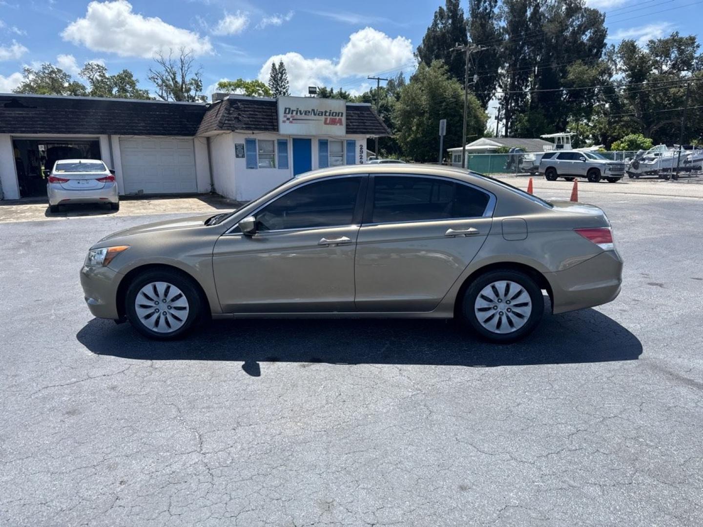2009 TAN HONDA ACCORD LX (1HGCP26399A) with an 2.4L engine, Automatic transmission, located at 2929 9th St. West, Bradenton, 34205, (941) 242-2810, 27.473591, -82.570679 - Thanks for inquring into DriveNation USA! All vehicles listed can be viewed at www.drivenationusa.com for vehicle history reports and additonal info. We cannot quote any terms such as down payments or monthly payments without an application. You can apply directly at www.drivenationusa.com or by con- Photo#4